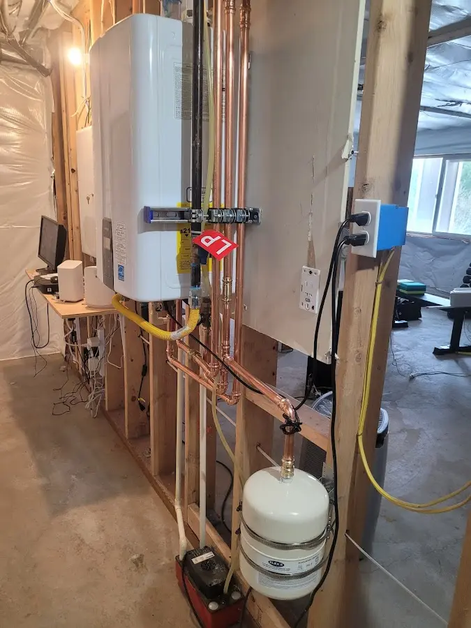 Licensed plumber repairing a kitchen sink in Lemont